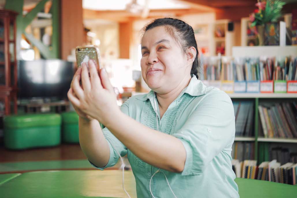woman taking selfie