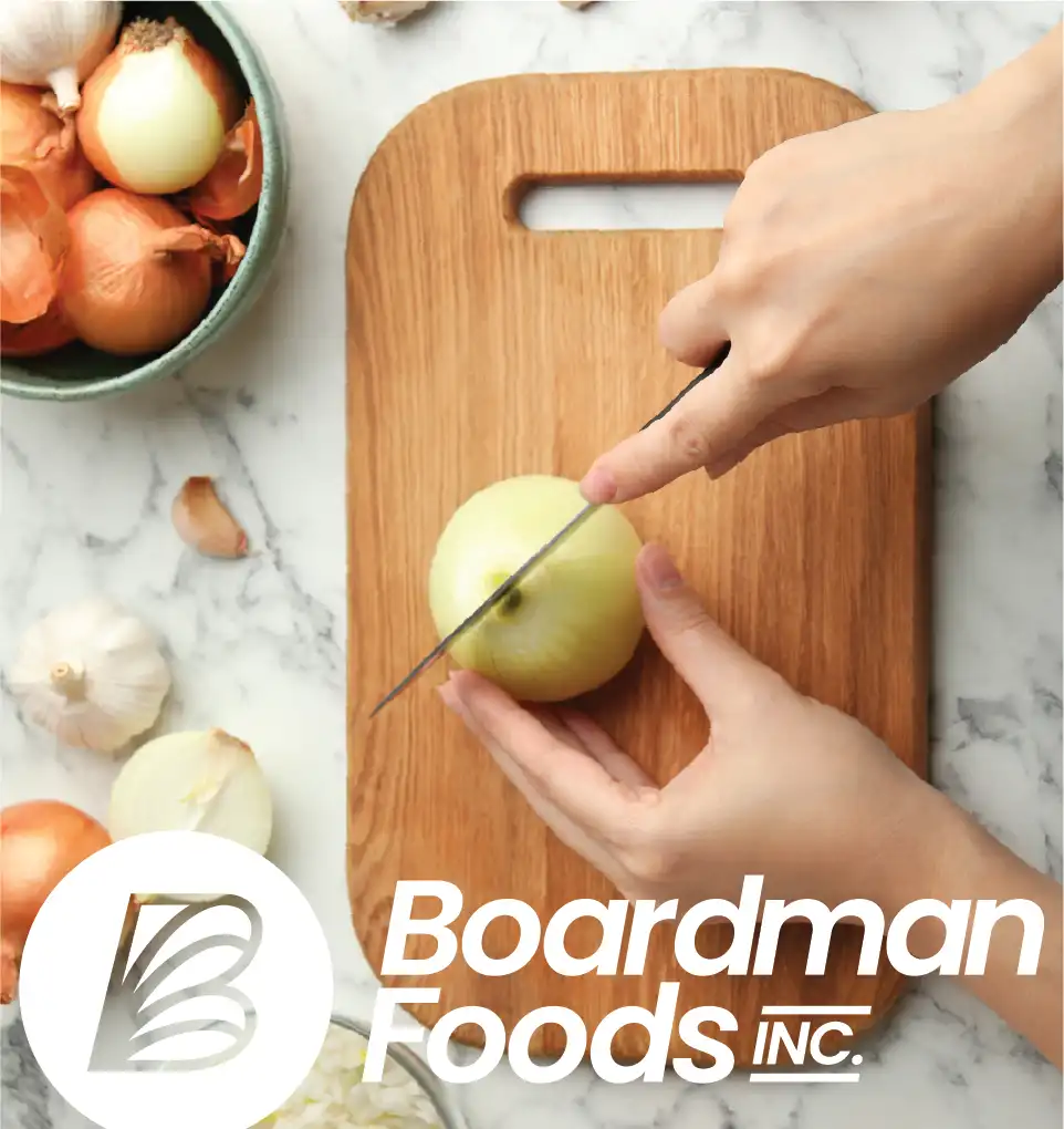 boardman foods logo over an image of a cutting board where onions are being sliced
